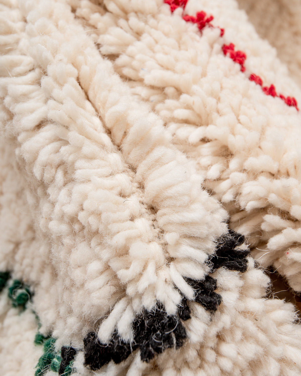Modern, designer, handcrafted Berber rug from Morocco. Beniourain carpet with beautiful colours and patterns and fluffy wool texture.
